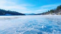 Blue ice and cracks on the surface of the ice. Frozen lake under a blue sky in the winter Royalty Free Stock Photo