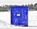 Blue Ice Fishing Shanty on Frozen Lake