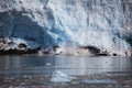 Blue ice and small icebergs. Glacier front in the arctic Svalbard