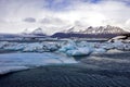 Blue Icebergs of Jokulsarlon with Snaefell Mountain, Iceland