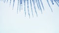 Blue icicles, white background.
