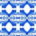 Blue ikat on a white background. Traditional Abstract art seamless pattern on the fabric