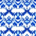 Blue ikat on a white background. Traditional Abstract art seamless pattern on the fabric