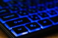 Blue illuminated computer keyboard buttons Royalty Free Stock Photo