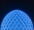 Blue illuminated sphere dome located next to Sheikh Zayed Grand Mosque in Abu Dhabi UAE, shot at night. Royalty Free Stock Photo