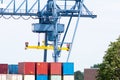 Blue industrial crane of a container terminal Royalty Free Stock Photo