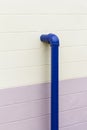 Blue industrial pipe on the wall Royalty Free Stock Photo