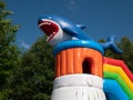Blue inflatable shark, bottom view. Concept of children\'s playground, entertainment, amusement Royalty Free Stock Photo
