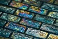 Mosaic iridescent glass tiles or bottom of bottles abstract Royalty Free Stock Photo