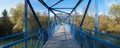 Blue iron bridge over Loisach river, Wolfratshausen in autumn season