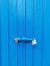 blue iron door closed with two padlocks, closed doors Royalty Free Stock Photo