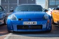 Blue Japanese Nissan 350Z sports car parked on the street Royalty Free Stock Photo