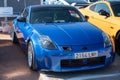 Blue Japanese Nissan 350Z sports car parked on the street Royalty Free Stock Photo