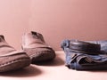 Blue jean with still life of old leather boots, work harder men style Royalty Free Stock Photo