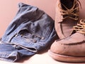 Blue jean with still life of old leather boots, work harder men style Royalty Free Stock Photo