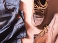 Blue jean with still life of old leather boots, work harder men style Royalty Free Stock Photo