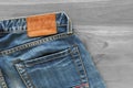 Blue jeans with back pocket and brown leather tag Royalty Free Stock Photo