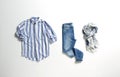 Blue jeans, blue and white striped shirt and scarf