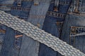 Blue jeans and braided belt Royalty Free Stock Photo