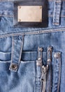 Blue jeans with bronze label