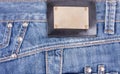 Blue jeans with bronze label
