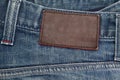 Blue jeans with brown leather tag Royalty Free Stock Photo