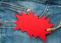 Blue jeans detail with red tag. Black friday Royalty Free Stock Photo