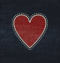 Blue jeans fabric with heart Royalty Free Stock Photo