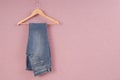 A blue jeans are on hanger. Royalty Free Stock Photo