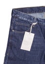 Blue Jeans With Label On White Background Royalty Free Stock Photo