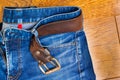 Blue jeans with a leather belt Royalty Free Stock Photo