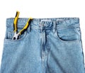 Blue jeans with pliers in the pocket Royalty Free Stock Photo
