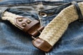 Blue jeans and white woven belt