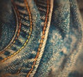 Blue Jeans with yellow stitching thread