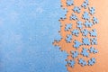 Blue jigsaw puzzle with copy space. Connected and missing blank puzzle pieces Royalty Free Stock Photo