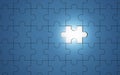 Blue jigsaw puzzle pieces with one piece glowing, 3d Royalty Free Stock Photo