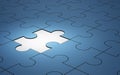 Blue jigsaw puzzle pieces with one piece glowing, 3d Royalty Free Stock Photo