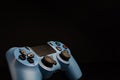 A blue joystick from a game console on a black background Royalty Free Stock Photo