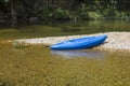 Blue Kayak on Gravel Bar