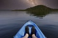 Blue kayak in Loch Lomond on open water at night Royalty Free Stock Photo
