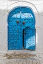 A blue keyhole, or Moorish, arch door on a house near the Tunis Souk