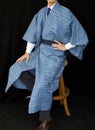 Blue Kimono Against a Black Background Royalty Free Stock Photo