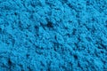 Blue kinetic sand as background, closeup view Royalty Free Stock Photo