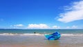 Blue kite surfing falling down on the pattaya beach with sea, cloud and clear blue sky background with copy space Royalty Free Stock Photo