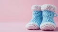 blue knitted baby booties. Selective focus. Royalty Free Stock Photo