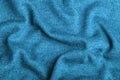 Blue knitted fabric texture close up. Can be used as a background. Selective focus Royalty Free Stock Photo