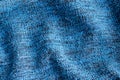 Blue knitted fabric texture. Crumpled blanket background Royalty Free Stock Photo
