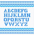 Blue knitting alphabet on white background