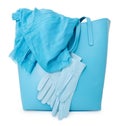 Blue ladies handbag with scarf and gloves, isolated Royalty Free Stock Photo