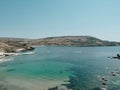 Blue lagon beach at Gozo island with floating boat Royalty Free Stock Photo